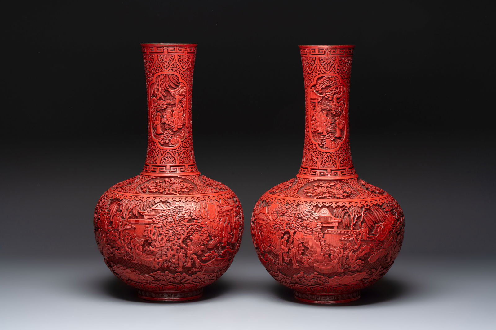 A pair of Chinese cinnabar lacquer 'Xi Xiang Ji' 'Tianqiu Ping' vases, 20th C. (1 of 6)