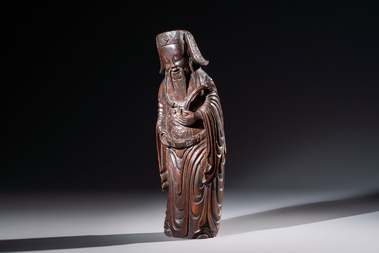 A large Chinese carved bamboo figure of Lu Xing, 19th C. (1 of 7)