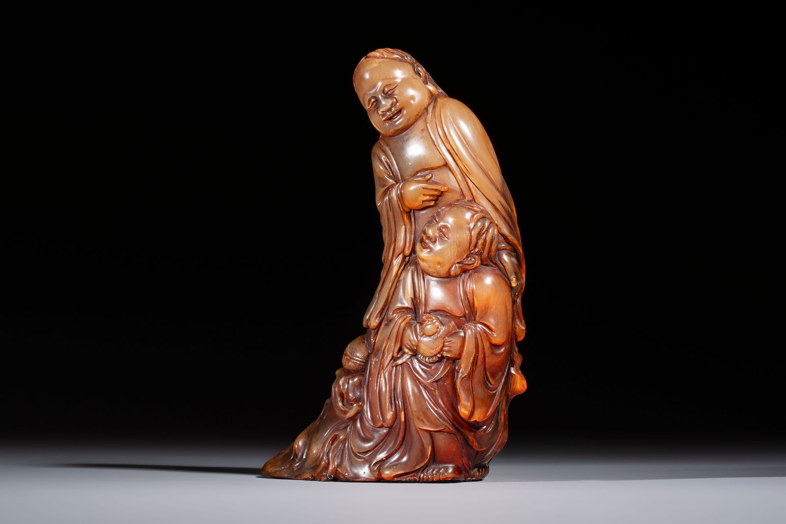 A Chinese carved buffalo horn 'Hehe Erxian' group, 17/18th C.: A Chinese carved buffalo horn 'Hehe Erxian' group, 17/18th C. H.: 19 cm