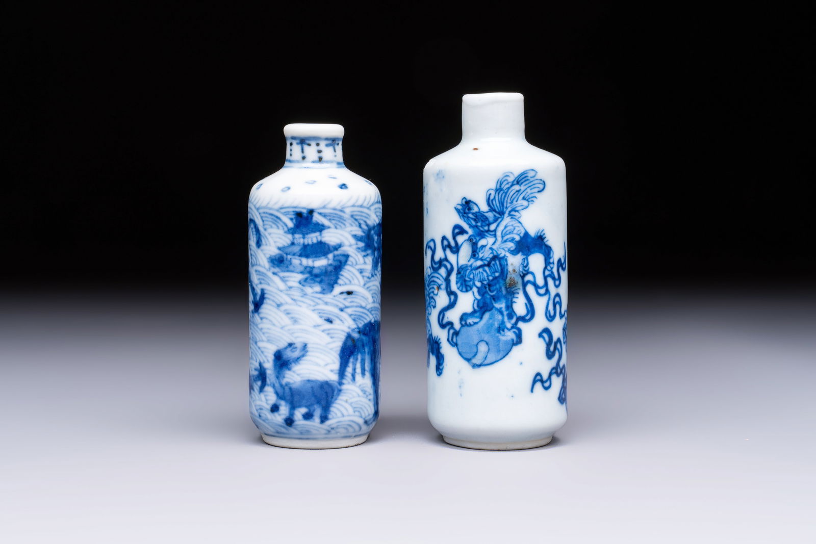 A Chinese blue and white 'Mythical Animals' snuff bottle and a 'Buddhist Lions' snuff bottle, 19th (1 of 6)