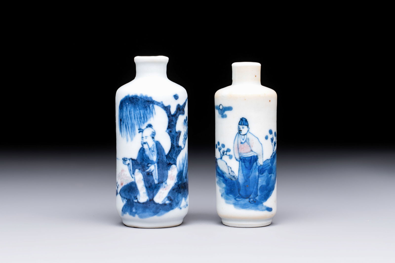 Two Chinese blue, white and copper-red snuff bottles with figural design, 19th C. (1 of 6)