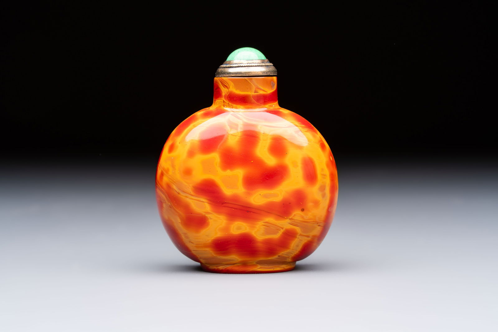 A Chinese 'Fired Up' glass snuff bottle, probably from the imperial Beijing glass workshop, (1 of 9)