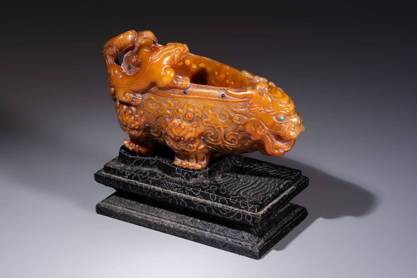 A Chinese precious-stone-inlaid carved soapstone wine vessel on stand, Gong, Republic (1 of 8)