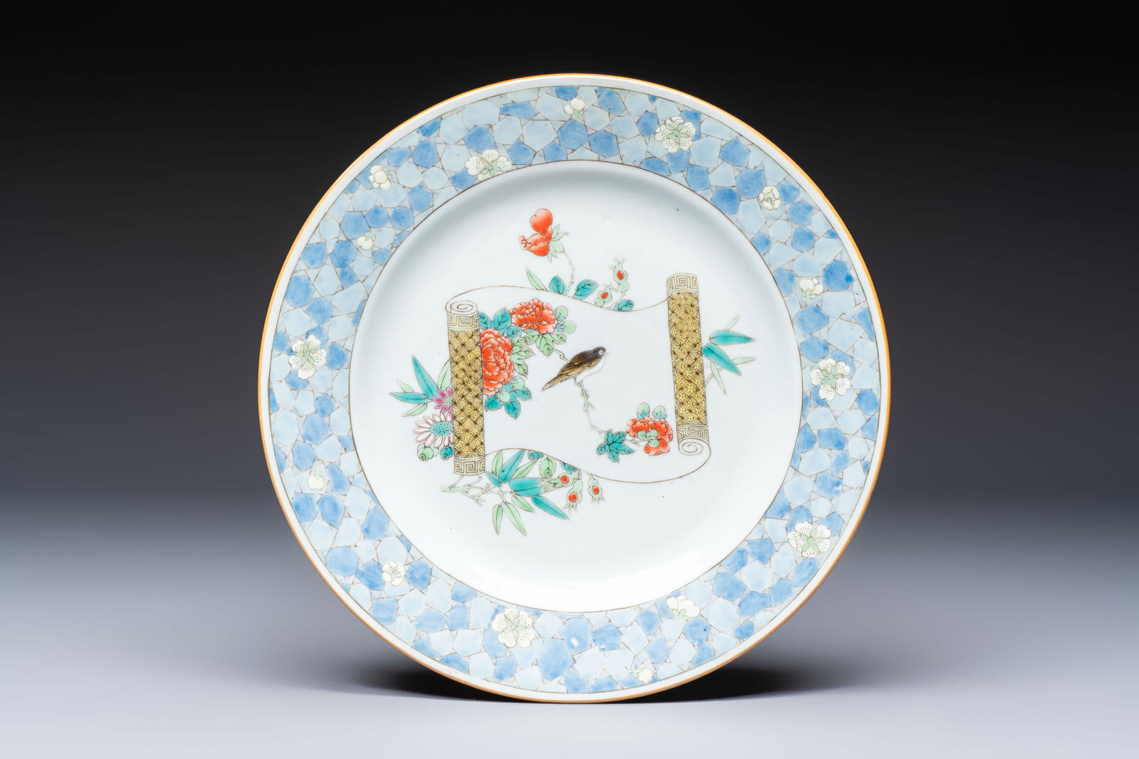 A Chinese famille rose ruby-back plate with a bird on a blossoming branch, Yongzheng (1 of 2)