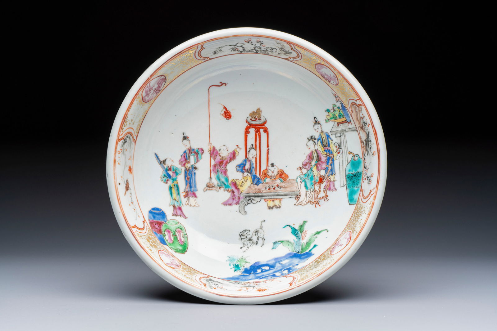 A Chinese Canton famille rose 'Mandarin Subject' bowl, Qianlong (1 of 3)