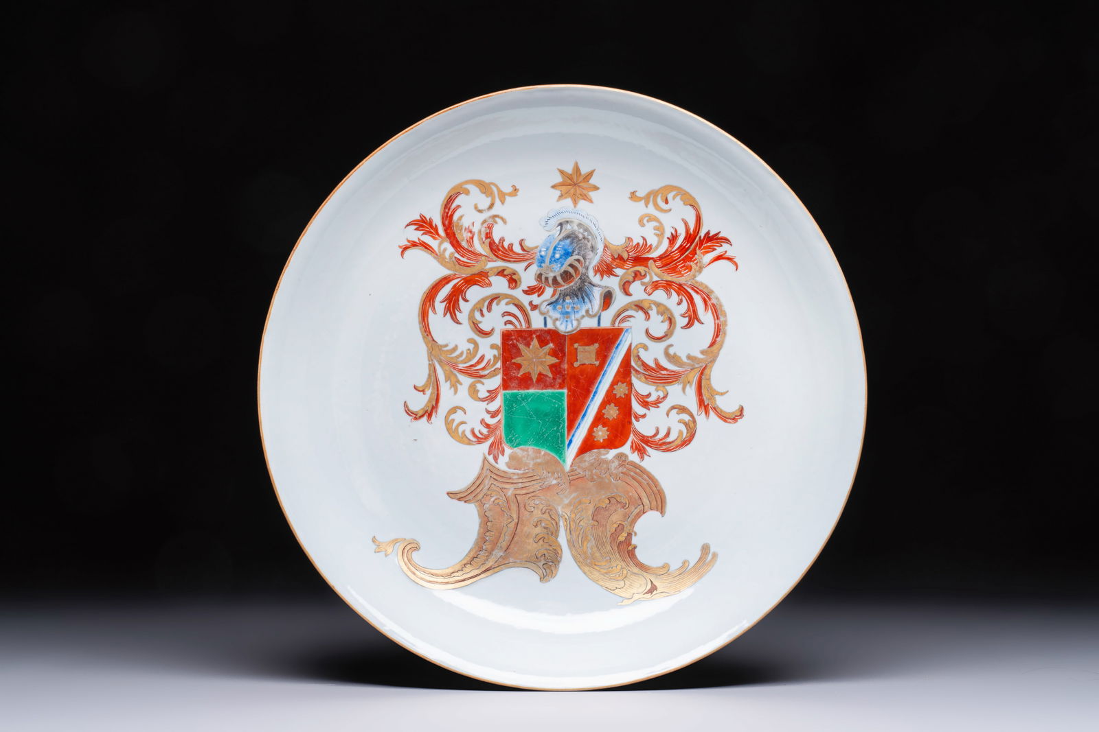 A rare large Chinese armorial dish with the arms of de Heere for the Dutch market, Qianlong, ca. (1 of 2)