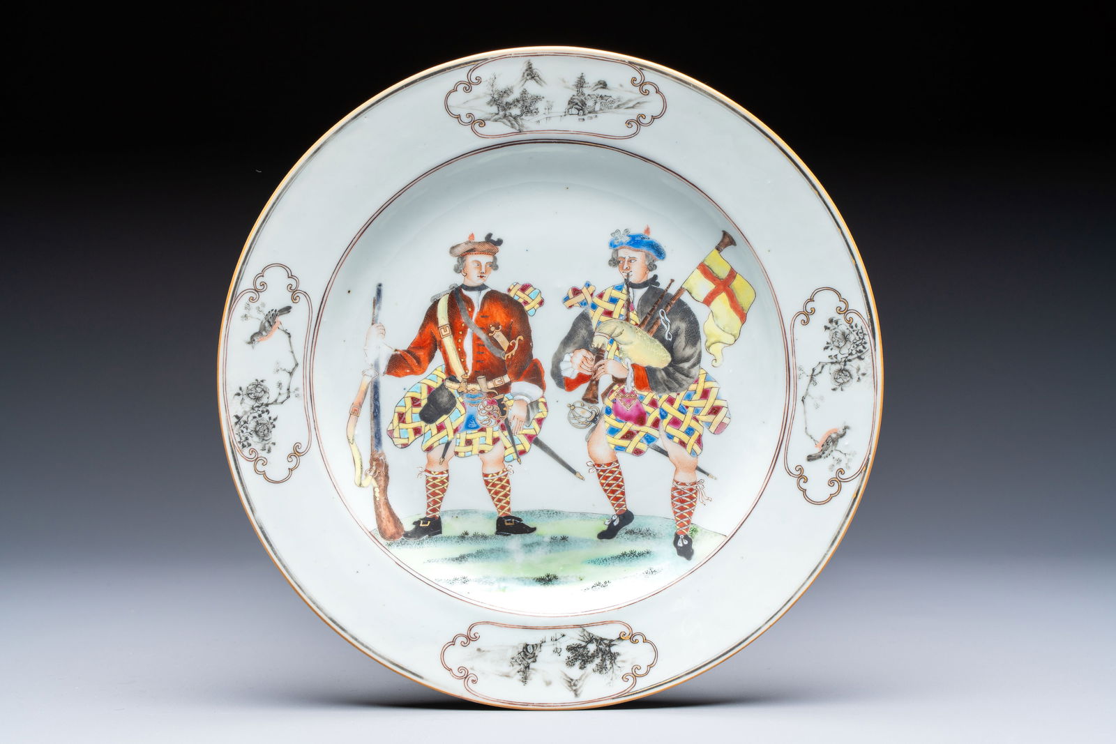 A very rare Chinese export 'Scotsmen' plate, Qianlong, ca. 1745: A very rare Chinese export 'Scotsmen' plate, Qianlong, ca. 1745 Dia.: 23 cm Provenance: - Previously in the collection of Maude Queiroz Pereira, Lisbon, with a label to the back. Ref.: - Christie's Ne