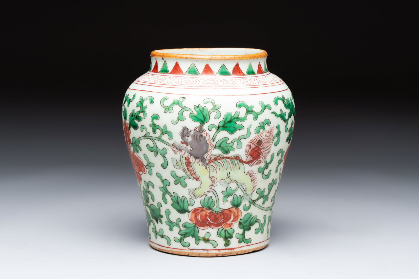 A small Chinese wucai 'Buddhist Lions and Peony Scrolls' jar, Transitional period (1 of 7)