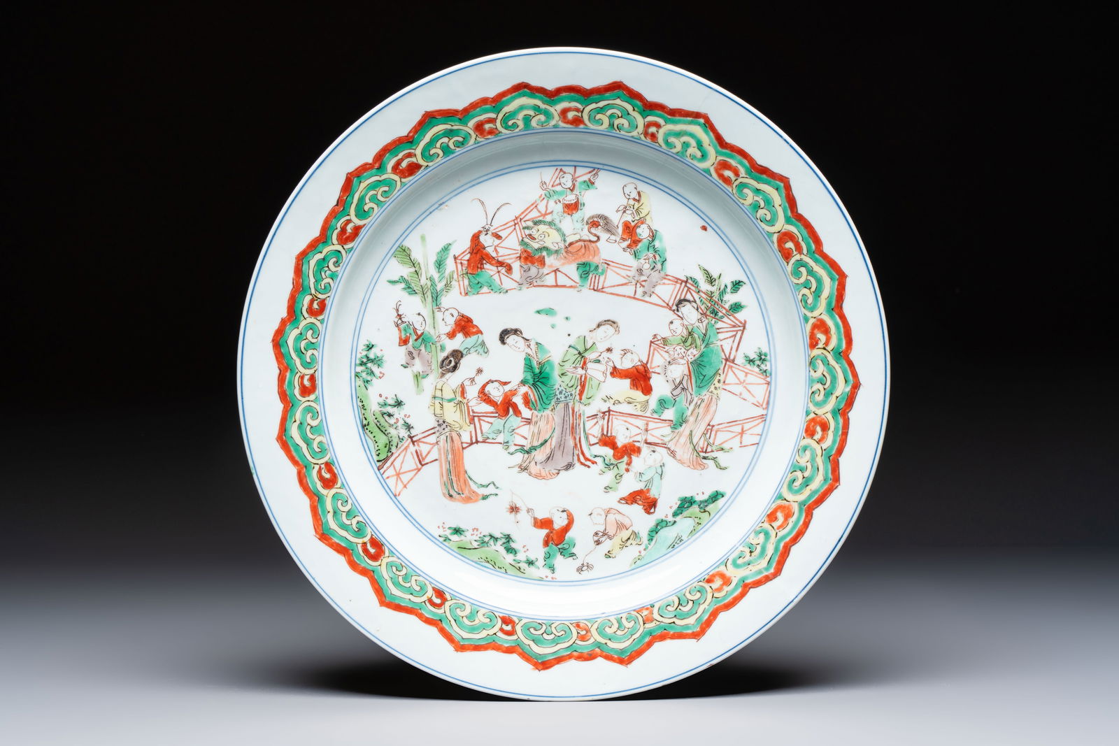 A Chinese famille verte 'Elegant Ladies and Playing Boys' dish, Chenghua mark, Kangxi (1 of 2)