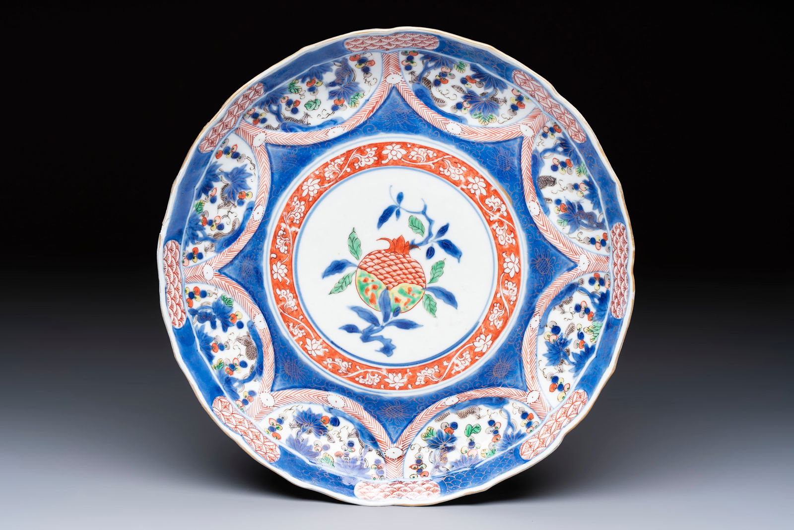 A Chinese famille verte blue-ground 'Pomegranate' dish, Kangxi (1 of 2)