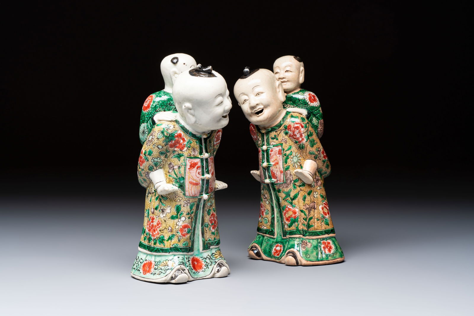 A pair of Chinese verte biscuit 'Piggyback Boys' groups, Kangxi (1 of 9)