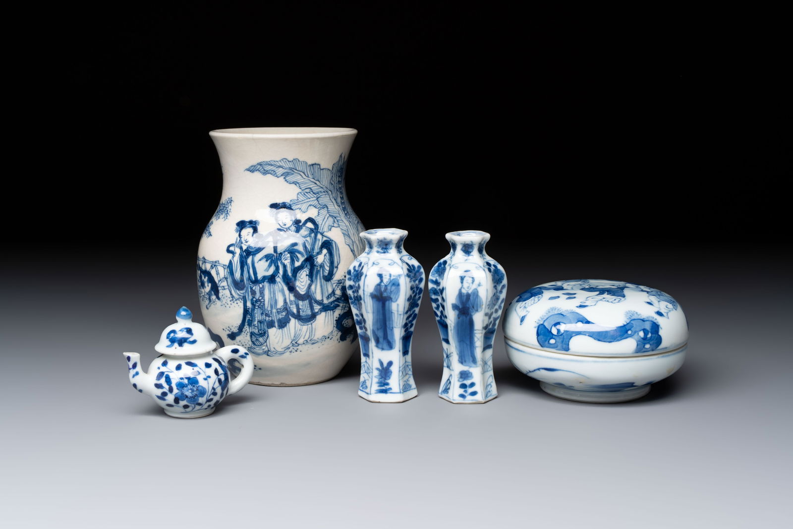 A Chinese blue and white vase, a pair of miniature vases, a covered teapot and a covered box, Kangxi (1 of 13)
