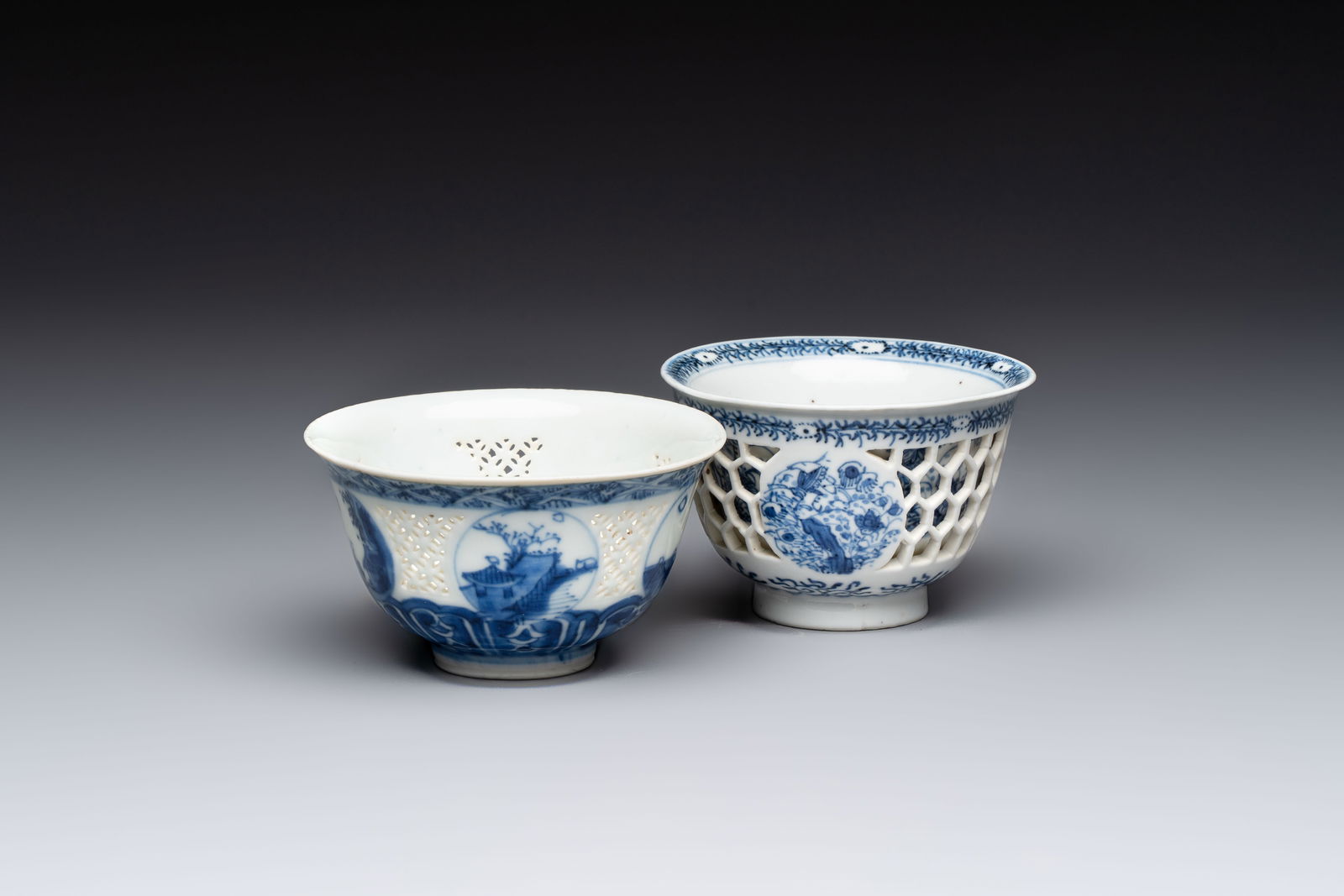 A Chinese blue and white reticulated double-walled cup and a pierced 'Hatcher Cargo' type bowl, (1 of 7)