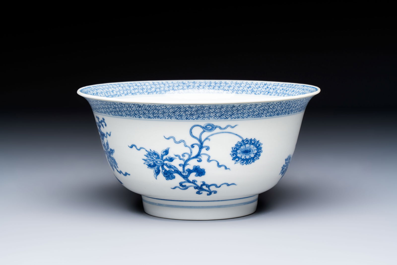 A Chinese blue and white 'Lotus' bowl, Chenghua mark, Kangxi: A Chinese blue and white 'Lotus' bowl, Chenghua mark, Kangxi Dia.: 19,7 cm - H.: 9,8 cm