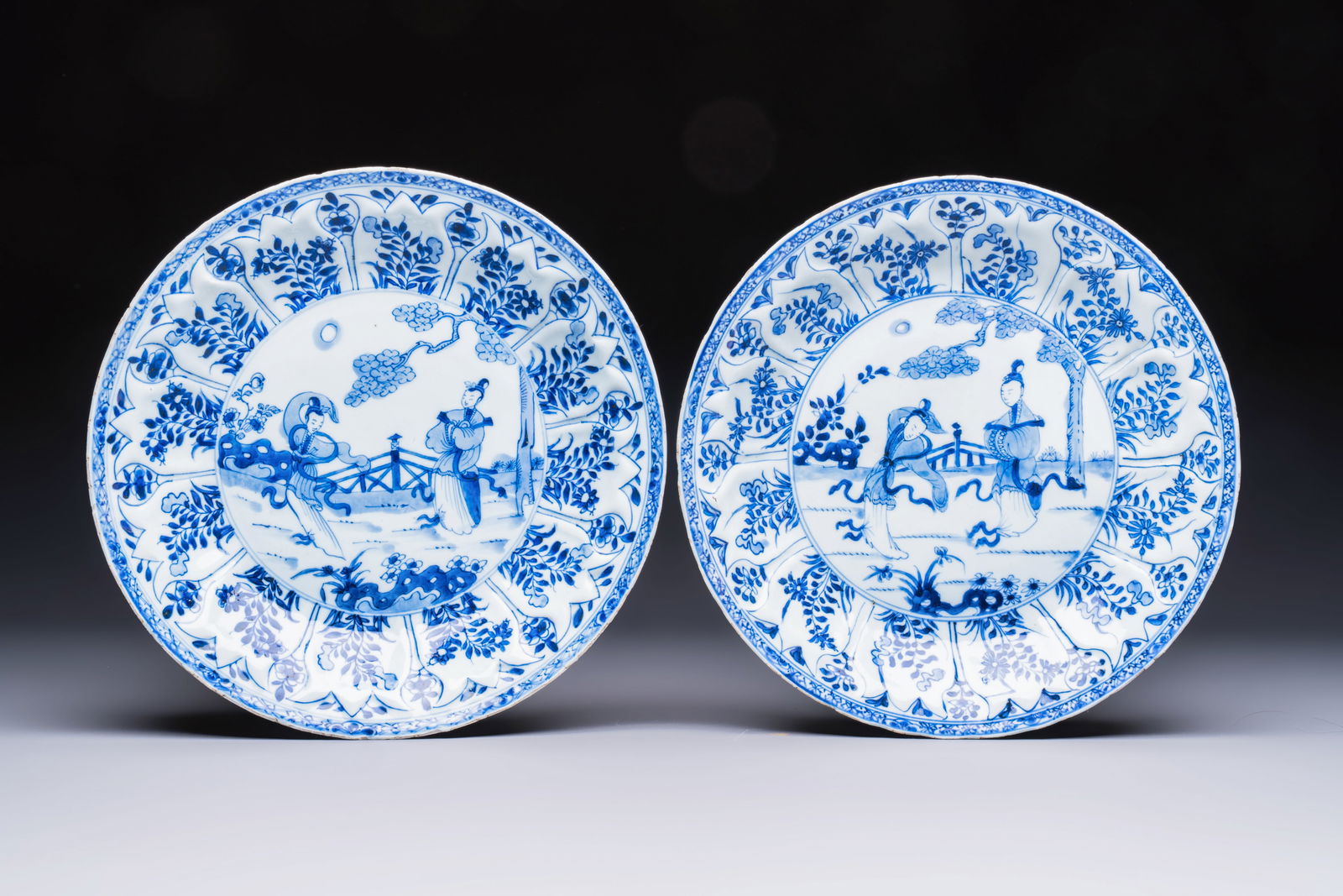 A pair of Chinese blue and white moulded dishes with dancing ladies, Kangxi (1 of 2)
