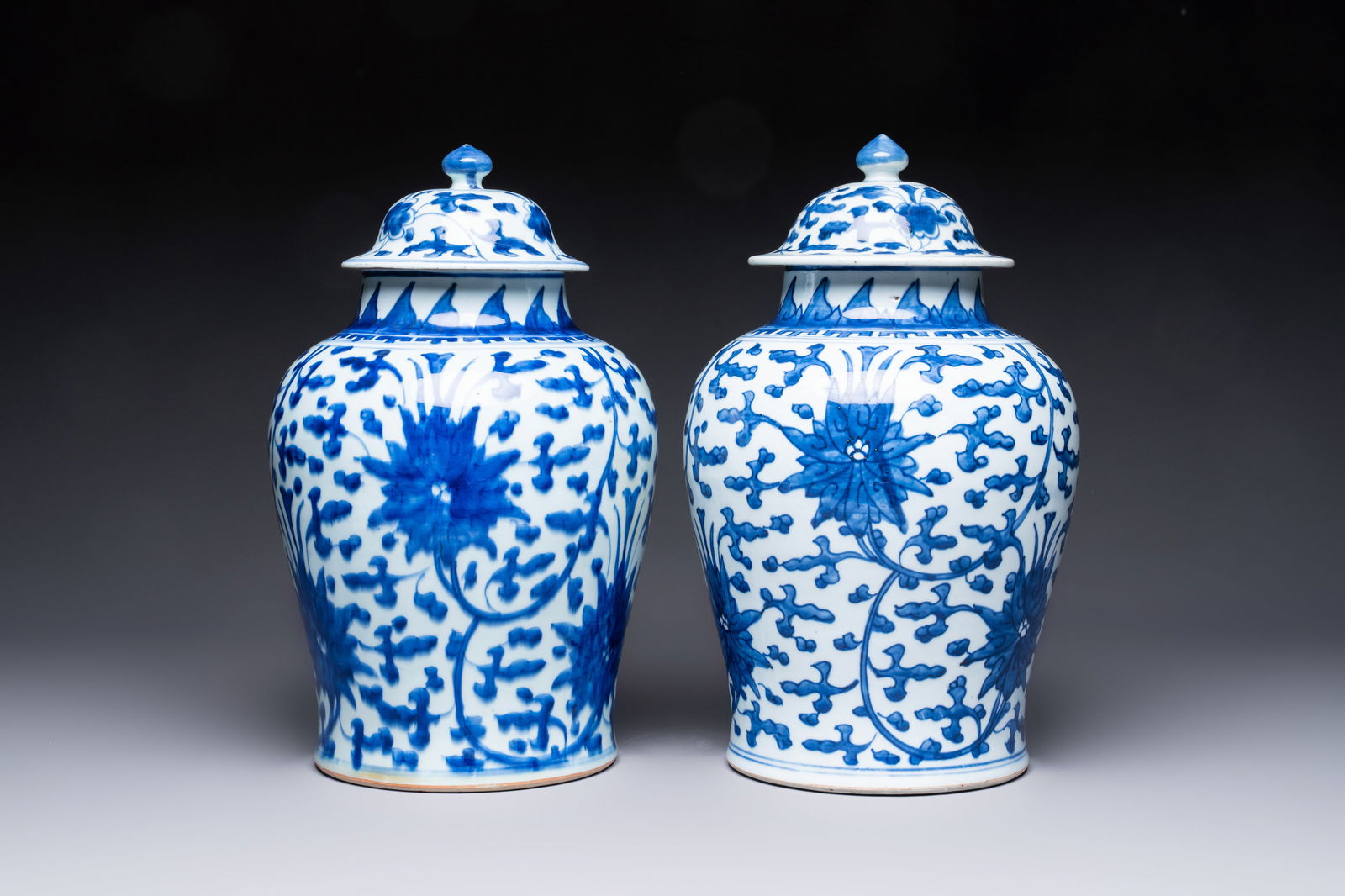 Two Chinese blue and white 'Lotus Scroll' vases and covers, Kangxi (1 of 6)