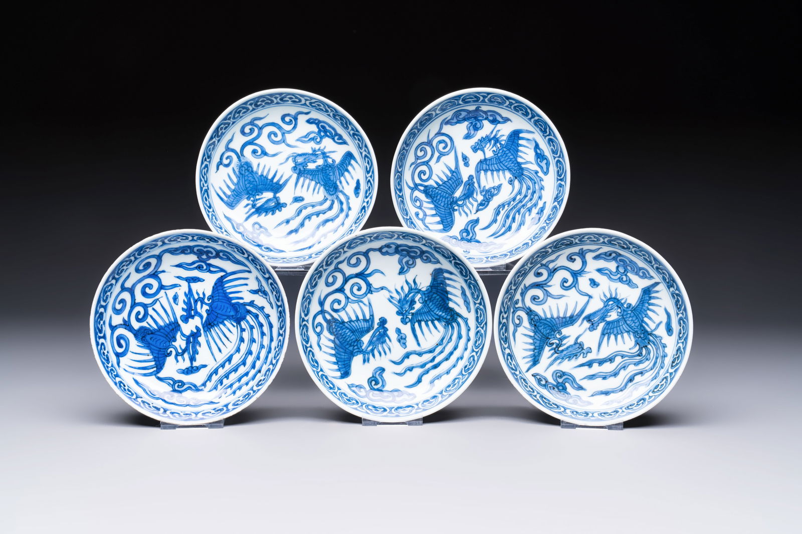 Five Chinese blue and white 'Phoenix' saucers, Wanli mark and of the period: Five Chinese blue and white 'Phoenix' saucers, Wanli mark and of the period Dia.: 13,4 cm