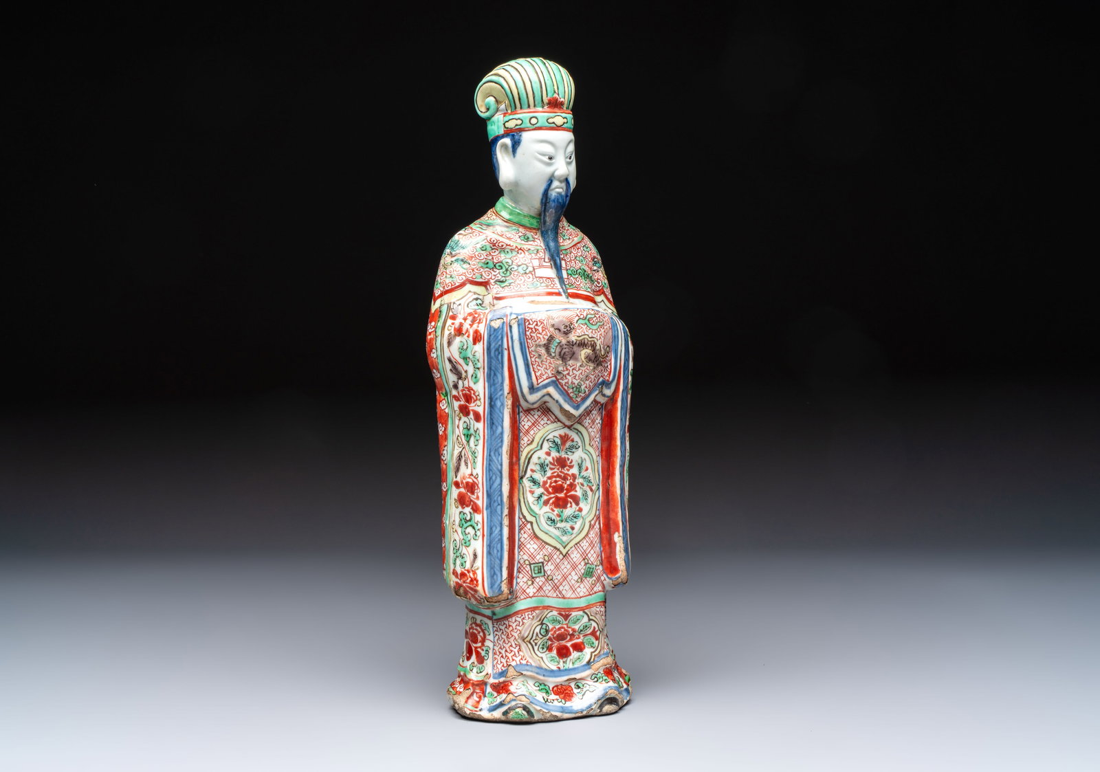A rare Chinese wucai figure of a dignitary, late Ming/Transitional period (1 of 7)