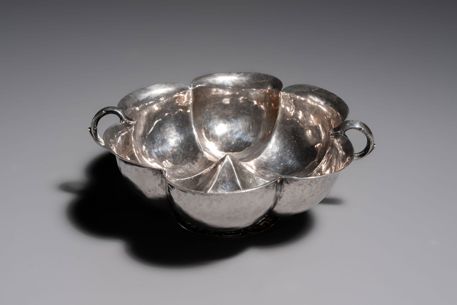 An Italian silver lobed serving bowl with twin handles, guild marks of the crossed Keys of St. (1 of 9)