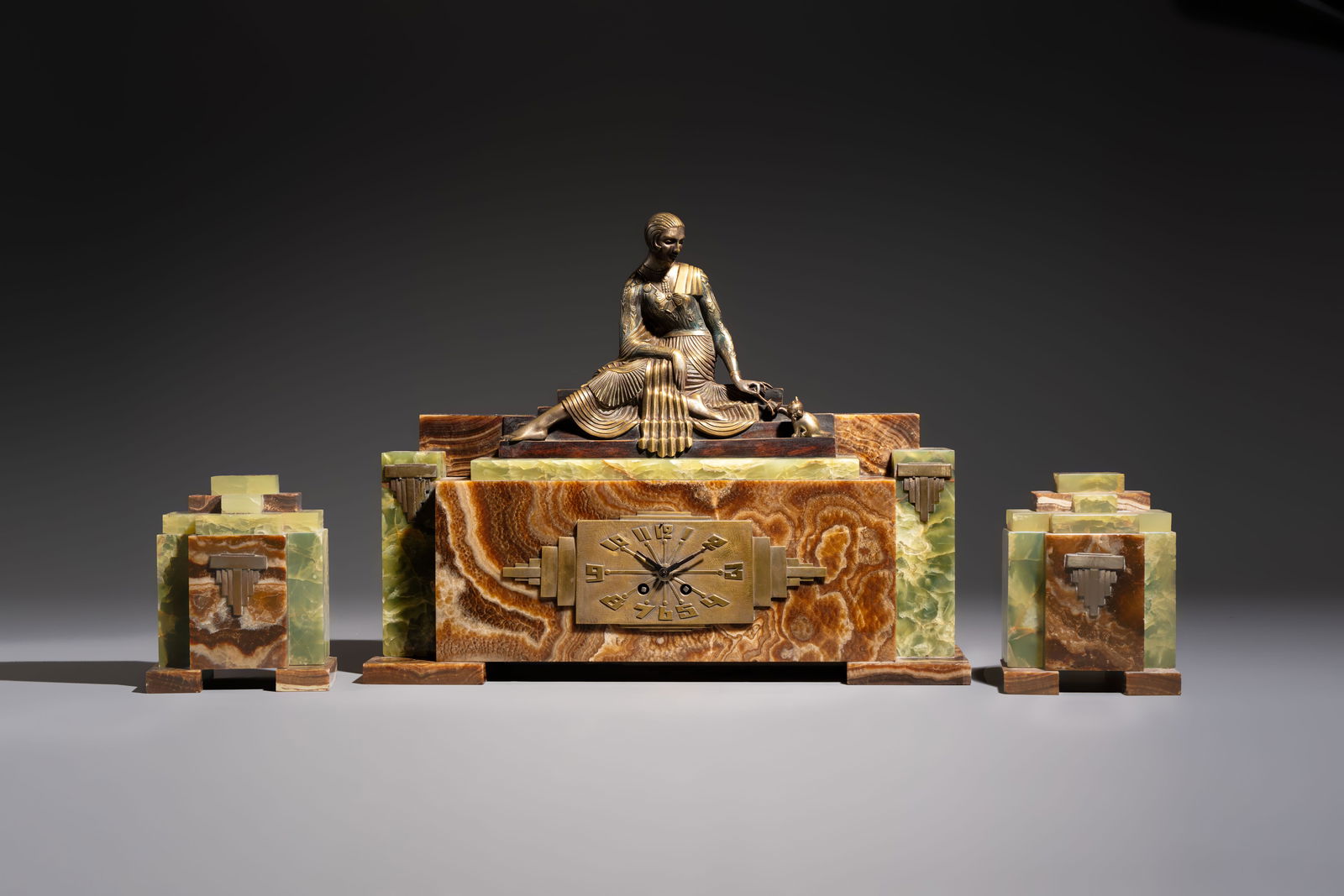 Georges Lavroff (1895–1991): An Art Deco three-piece copper-alloy-mounted green and brown onyx (1 of 15)
