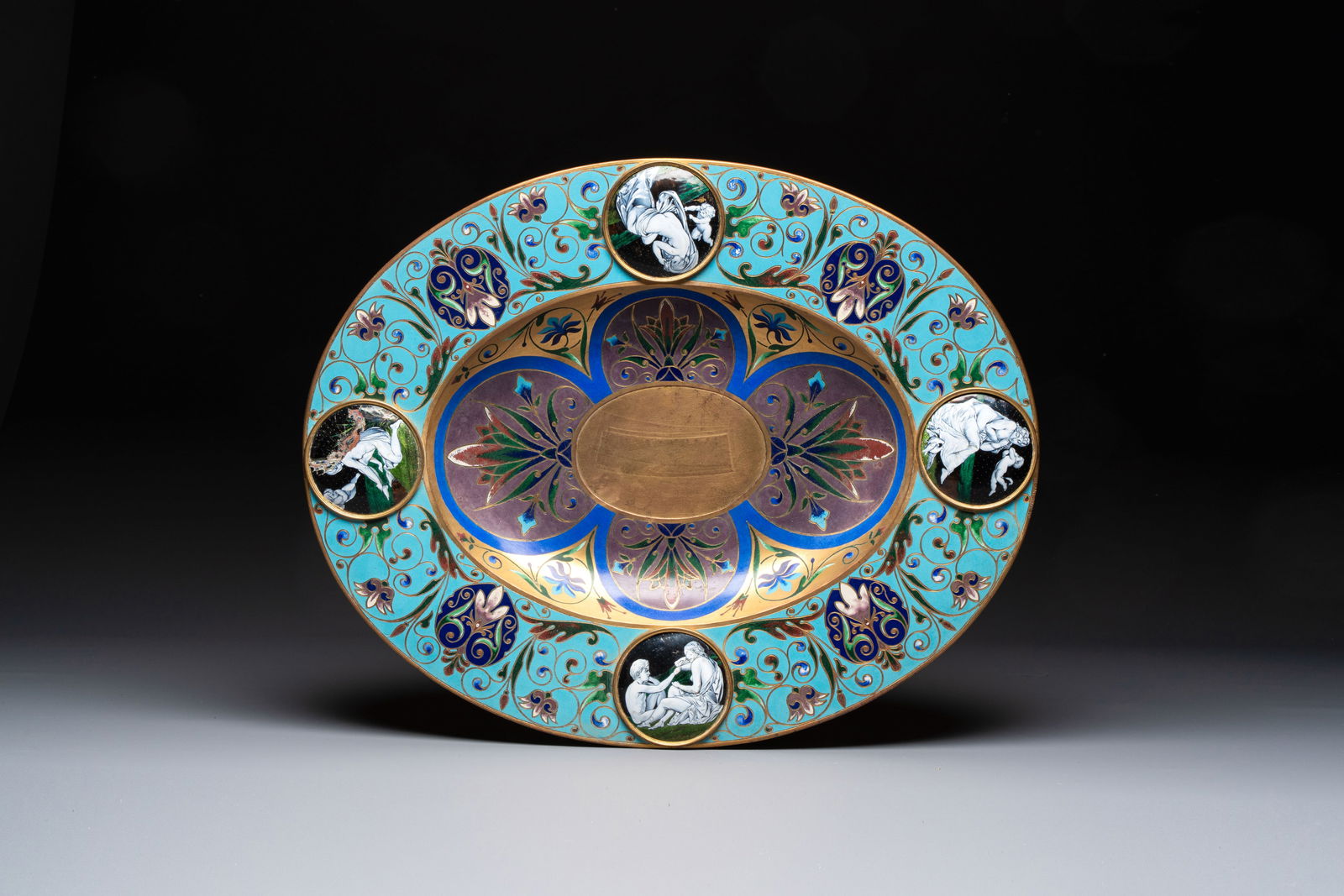A large champlevé enamelled gilt bronze dish with enamel medallions, illegibly signed, probably (1 of 2)