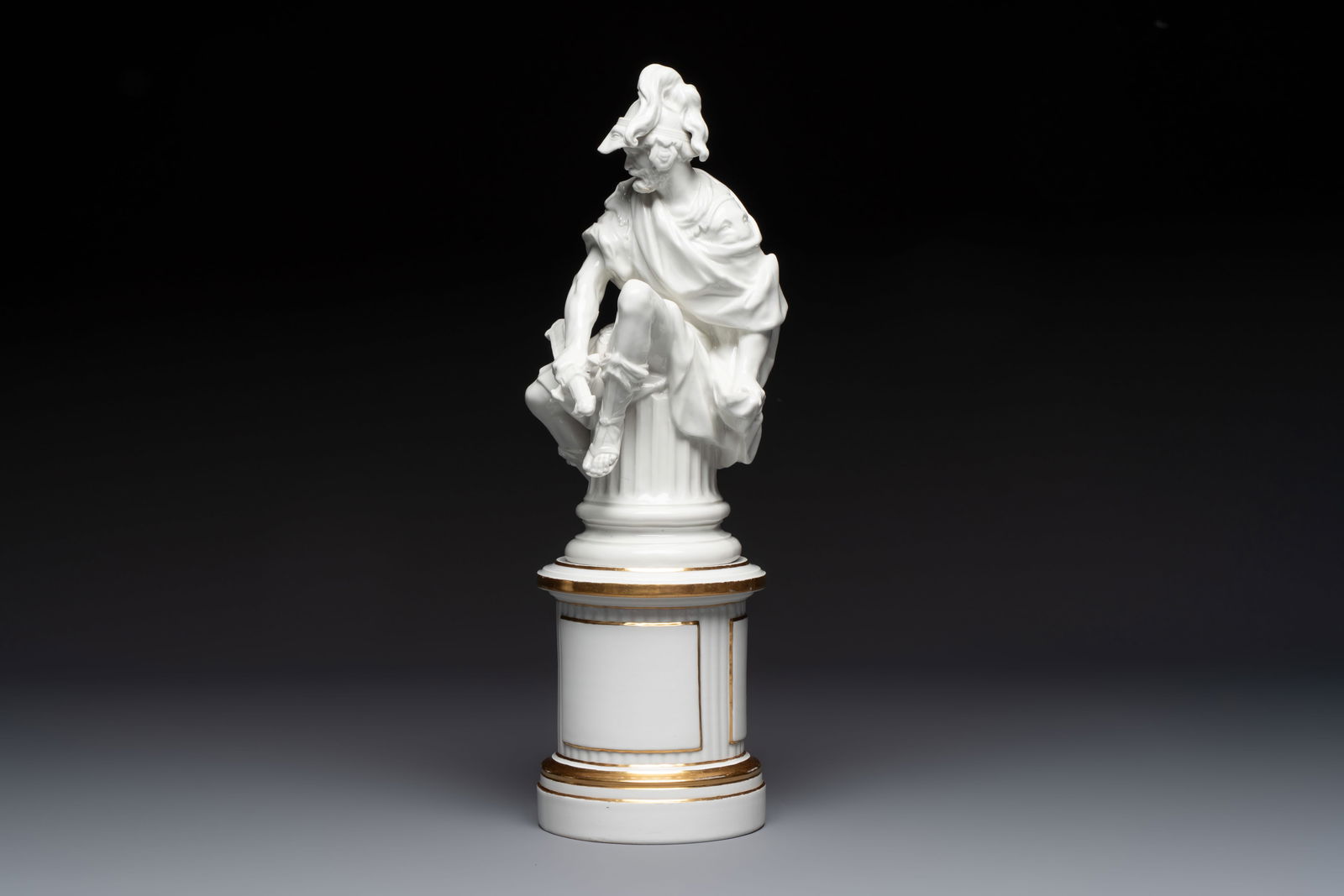 A KPM Berlin white-glazed porcelain sculpture of Mars at rest, on a gilt-decorated stand, the stand: A KPM Berlin white-glazed porcelain sculpture of Mars at rest, on a gilt-decorated stand, the stand marked, 19th C. H.: 39,5 cm Ref.: - Brandenburg Museum, Germany, object number XII 3107, for an iden