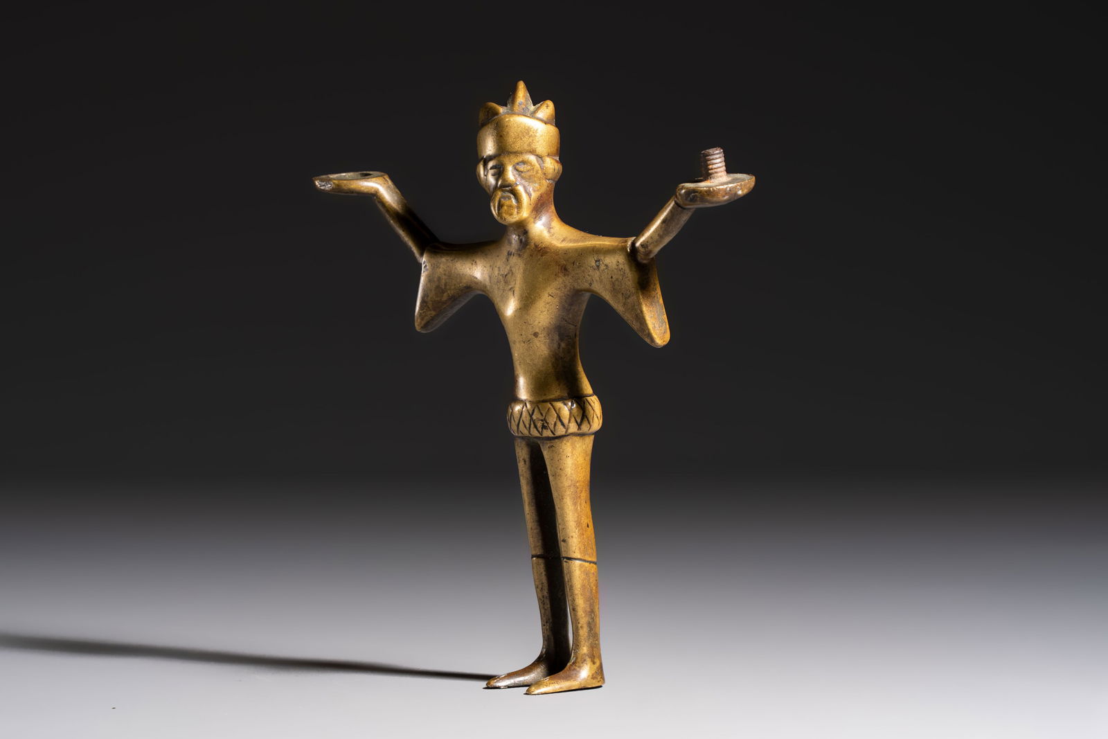 A Gothic bronze figural candlestick stem, Flanders, 15th C. (1 of 7)