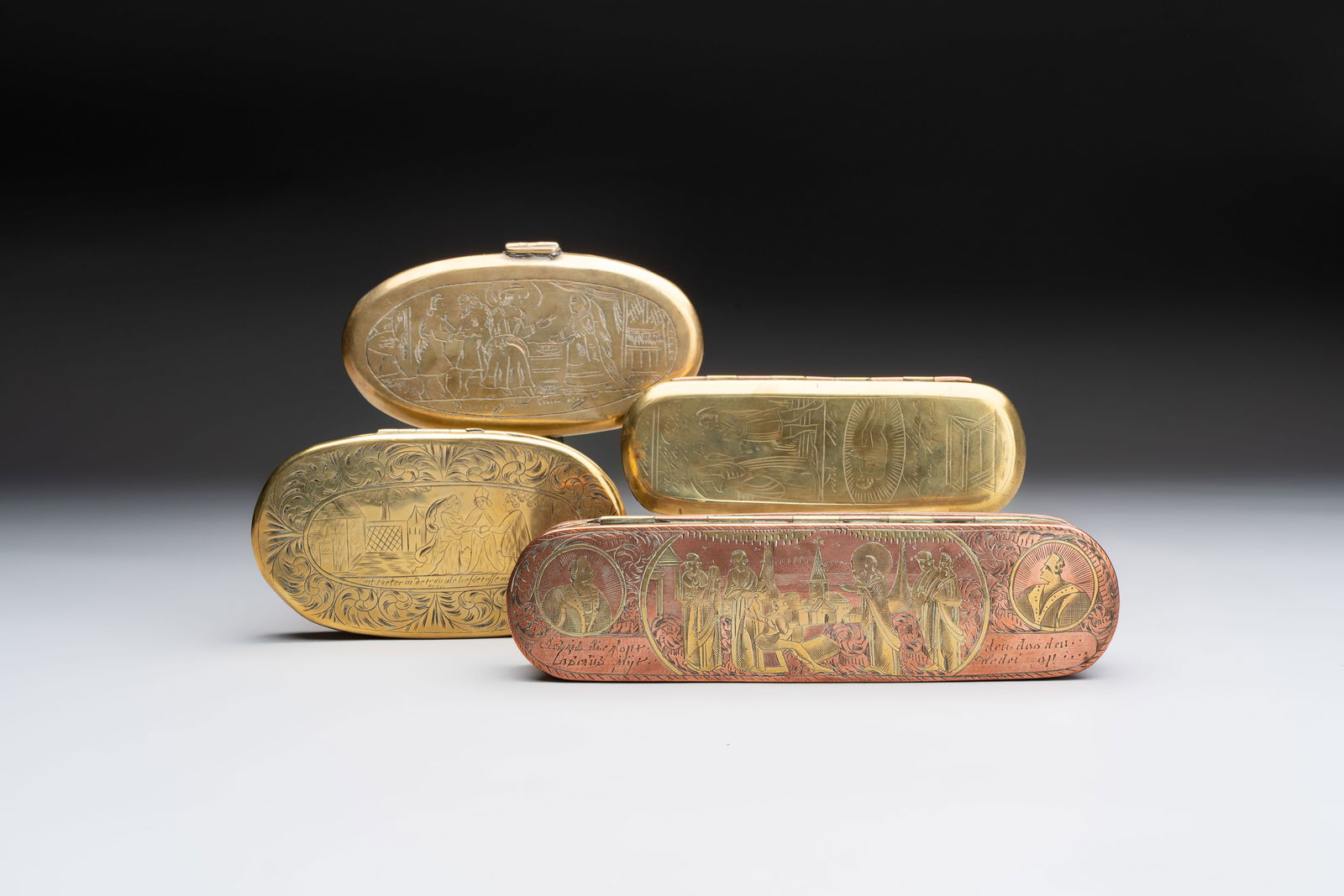 A group of four copper and brass engraved tobacco boxes, The Netherlands, 18th C. (1 of 13)