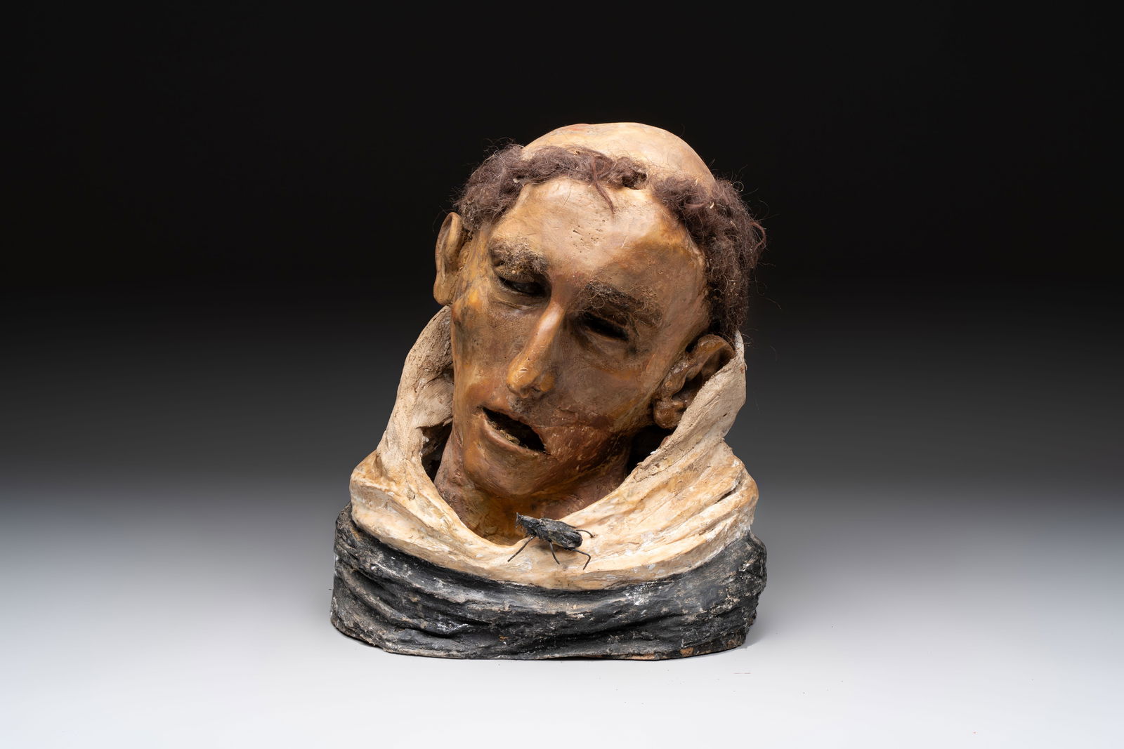 A macabre polychrome life-sized wax sculpture of a deceased monk, Italy, 19th C.: A macabre polychrome life-sized wax sculpture of a deceased monk, Italy, 19th C. H.: 32,5 cm