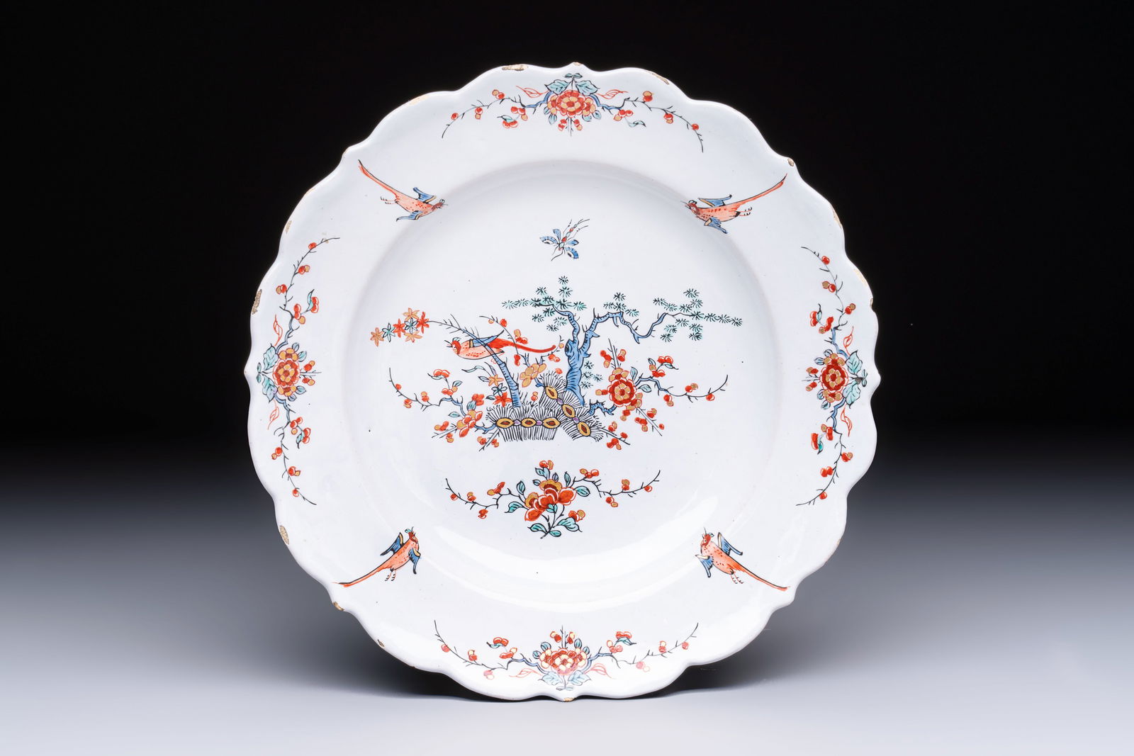 An unusual and very fine polychrome Dutch Delft Kakiemon-style lobed dish, early 18th C. (1 of 2)