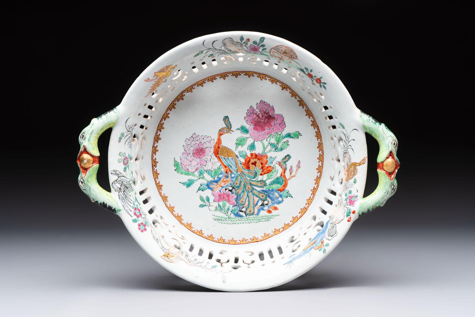 A polychrome Dutch Delft petit feu reticulated basket after a Chinese famille rose example, 18th C. (1 of 7)