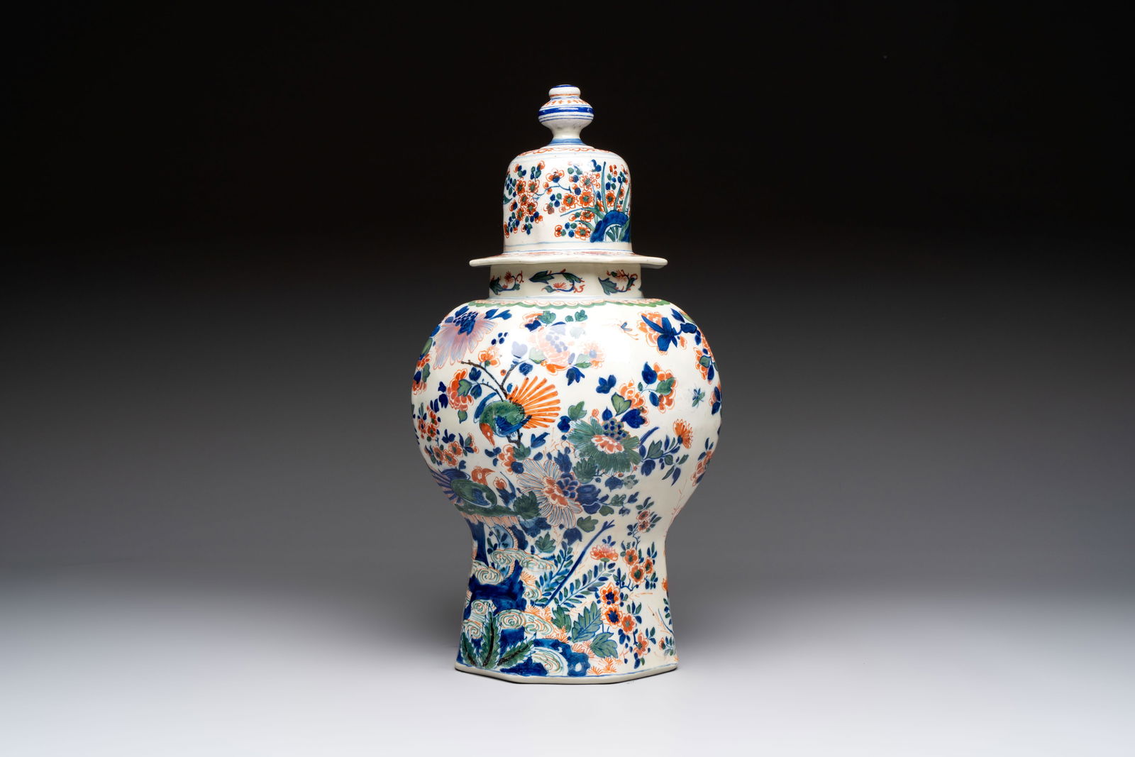 A Dutch Delft cashmere palette vase and cover with birds among flowering branches, ca. 1700: A Dutch Delft cashmere palette vase and cover with birds among flowering branches, ca. 1700 H.: 47,5 cm (incl. cover) Marked LVE in red on the base for Lambertus van Eenhoorn, the 'De Metaale Pot' wor