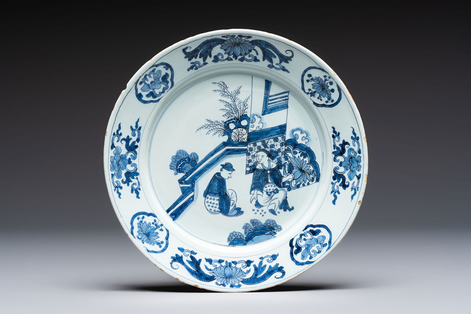 A fine blue and white Dutch Delft chinoiserie dish in the Transitional style, 17th C. (1 of 2)
