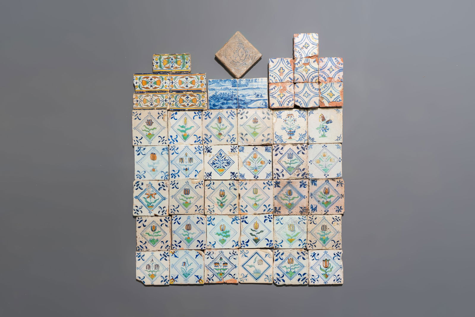 37 mostly polychrome Dutch Delft tiles, seven North African tiles and a French portrait tile, (1 of 1)