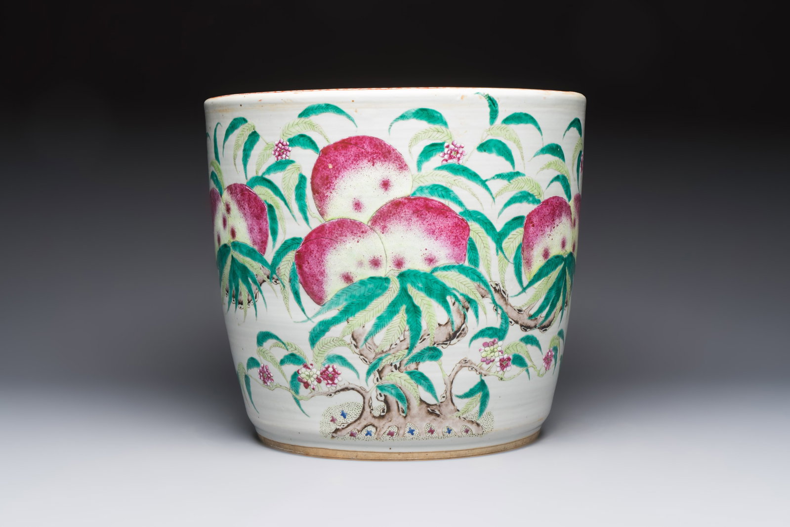A Chinese famille rose 'Nine Peaches' jardinière, 19th C. (1 of 7)