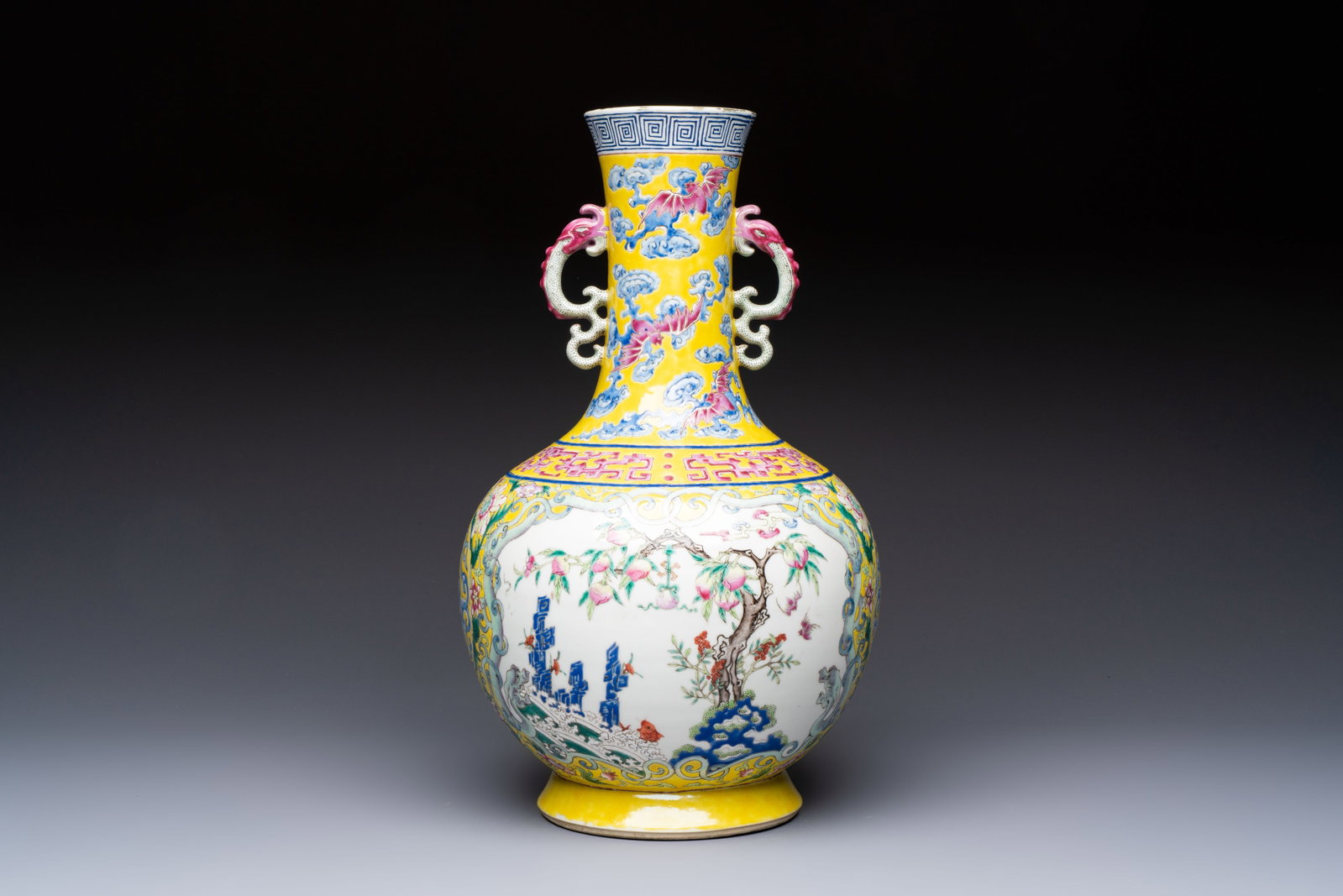 A Chinese famille rose yellow-ground 'Bats and Peaches' bottle vase, Jiaqing/Daoguang (1 of 6)