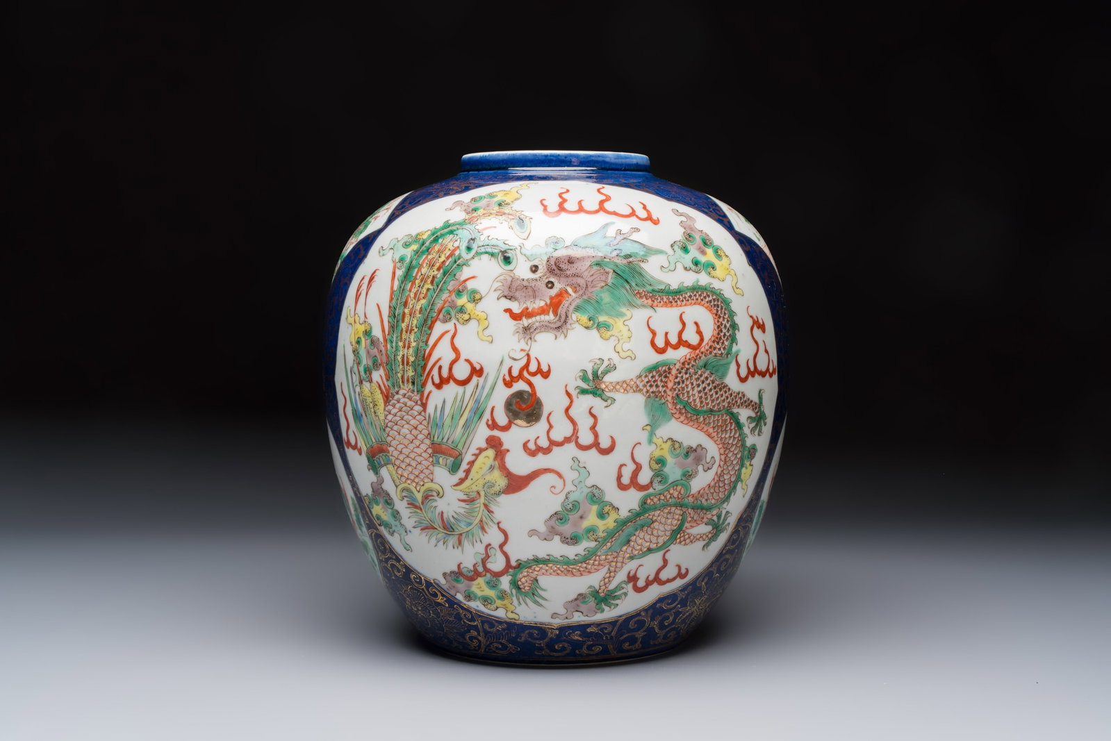 A Chinese famille verte gilt-decorated blue-ground 'Dragon and Phoenix' vase, Kangxi mark, 19th C. (1 of 6)