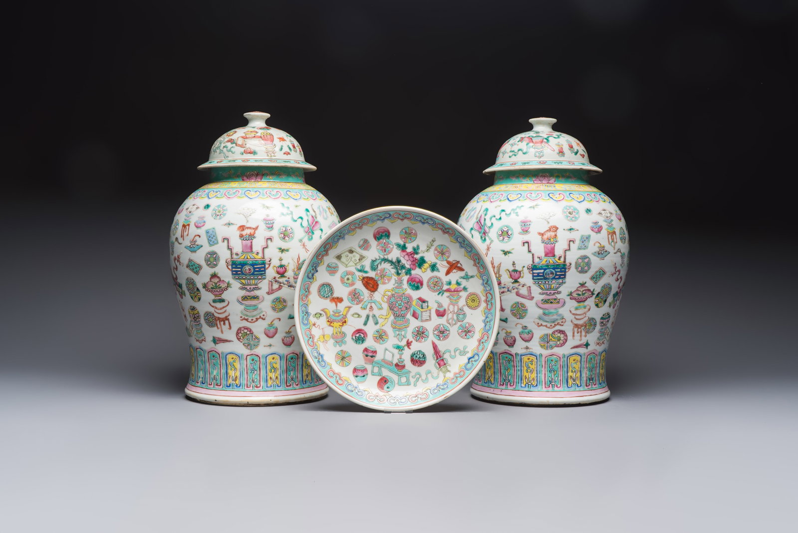 A pair of Chinese famille rose 'Antiquities' covered vases and a dish, 19th C. (1 of 9)