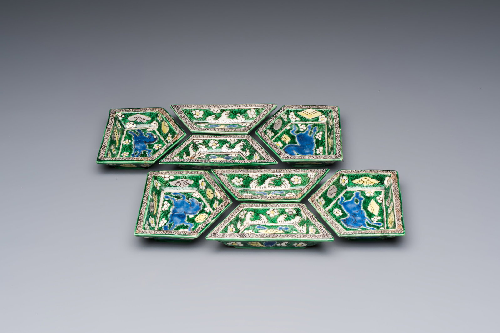 A Chinese verte biscuit eight-piece sweetmeat set with flying horses, 19th C. (1 of 9)
