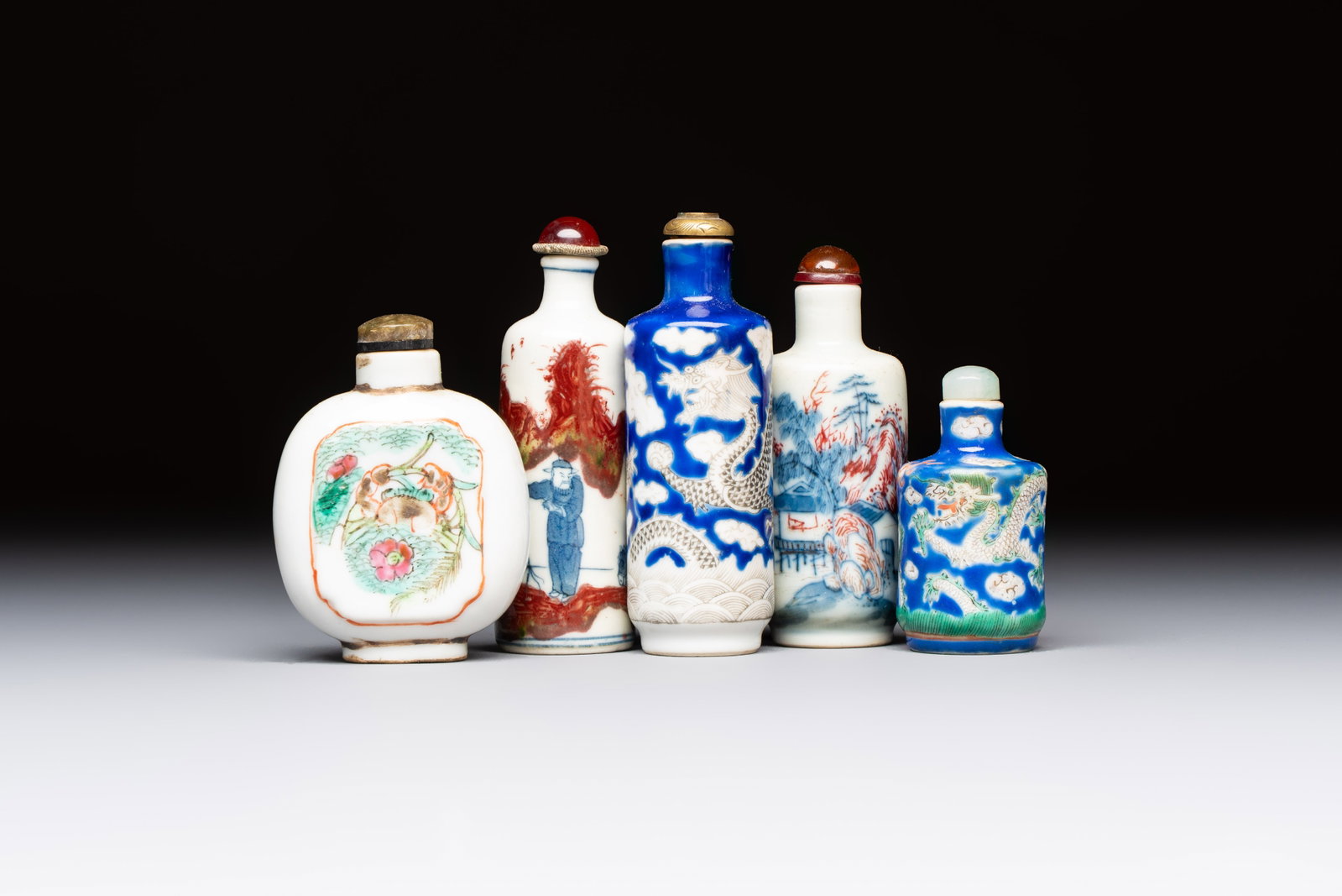 Five Chinese copper-red, blue and white, and polychrome snuff bottles, Yongzheng and Daoguang marks, (1 of 7)