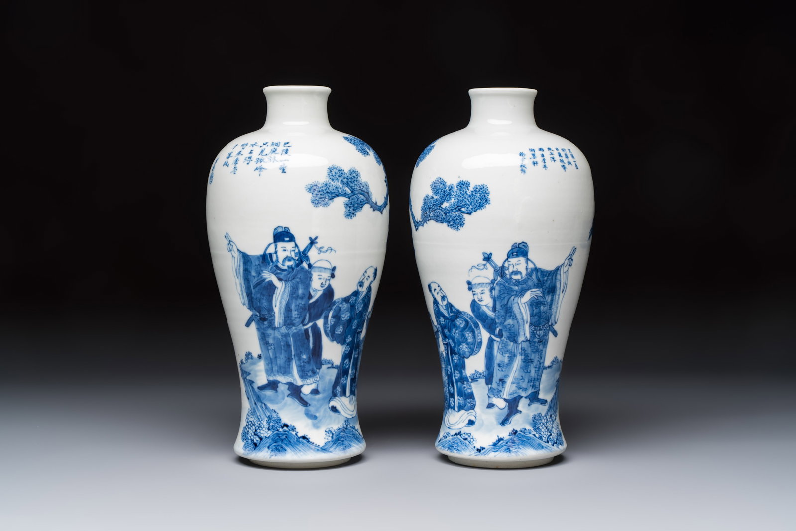 A pair of Chinese blue and white 'Meiping' vases with figures and a poem, signed Xu Banqiu: A pair of Chinese blue and white 'Meiping' vases with figures and a poem, signed Xu Banqiu ?????, Kangxi mark, 19th C. H.: 26 cm