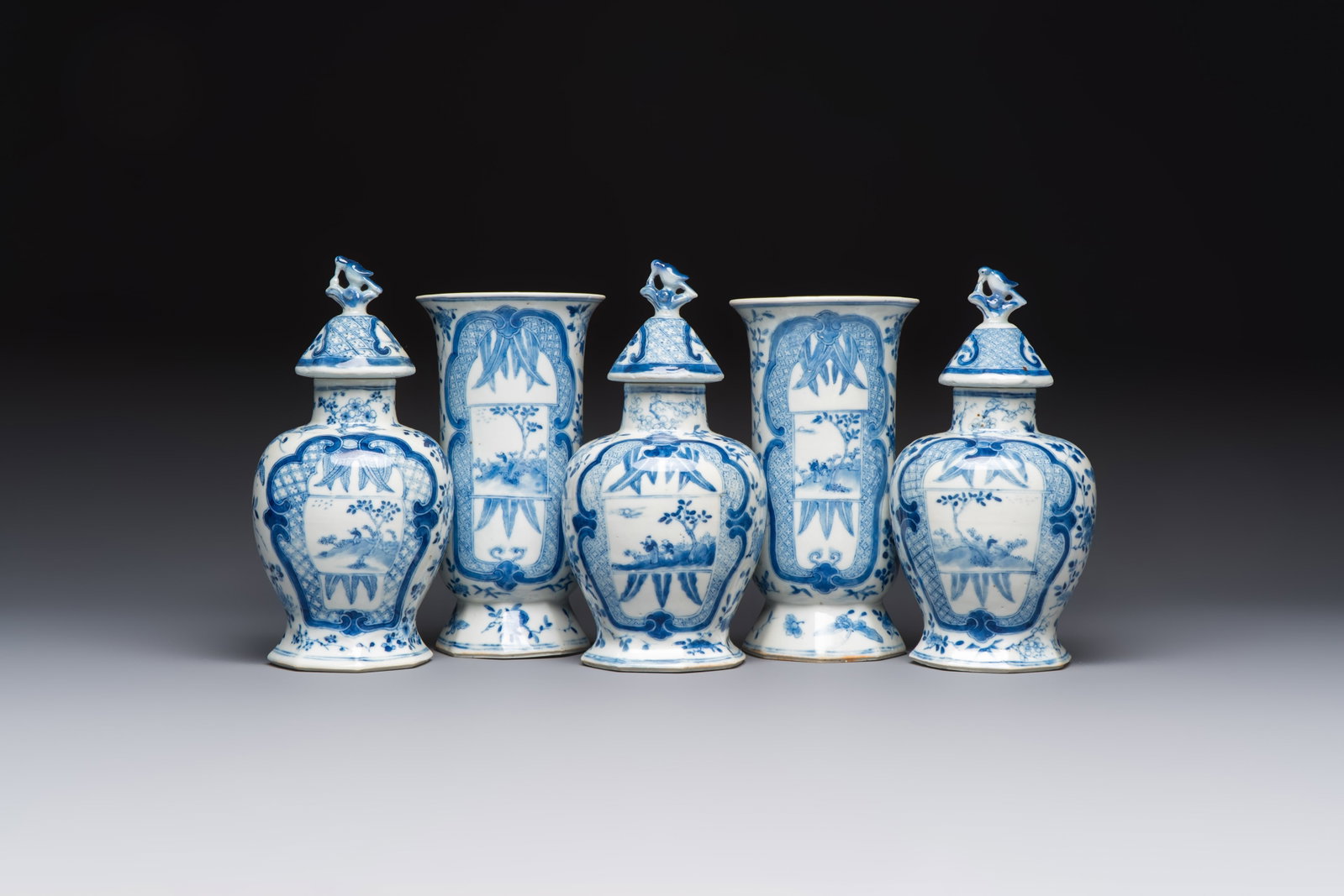 A rare Chinese blue and white five-piece garniture in Dutch Delft style, Kangxi mark, 19th C. (1 of 13)