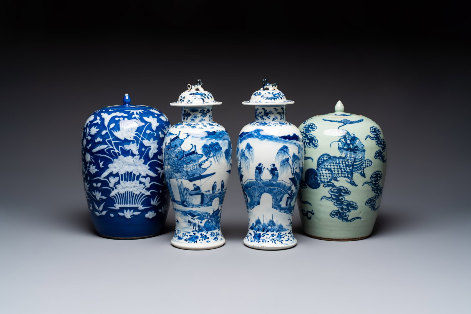 A pair of Chinese blue and white covered vases and two covered jars, Kangxi mark, 19th C (1 of 13)
