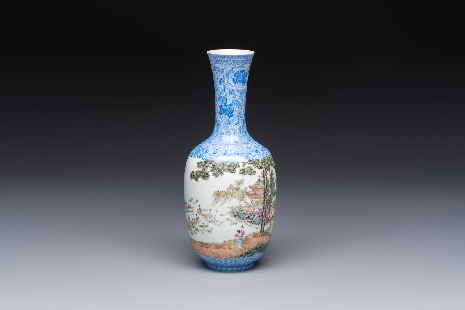 A Chinese famille rose 'Figures at a Lotus Pond' vase, Qianlong mark, 20th C. (1 of 7)
