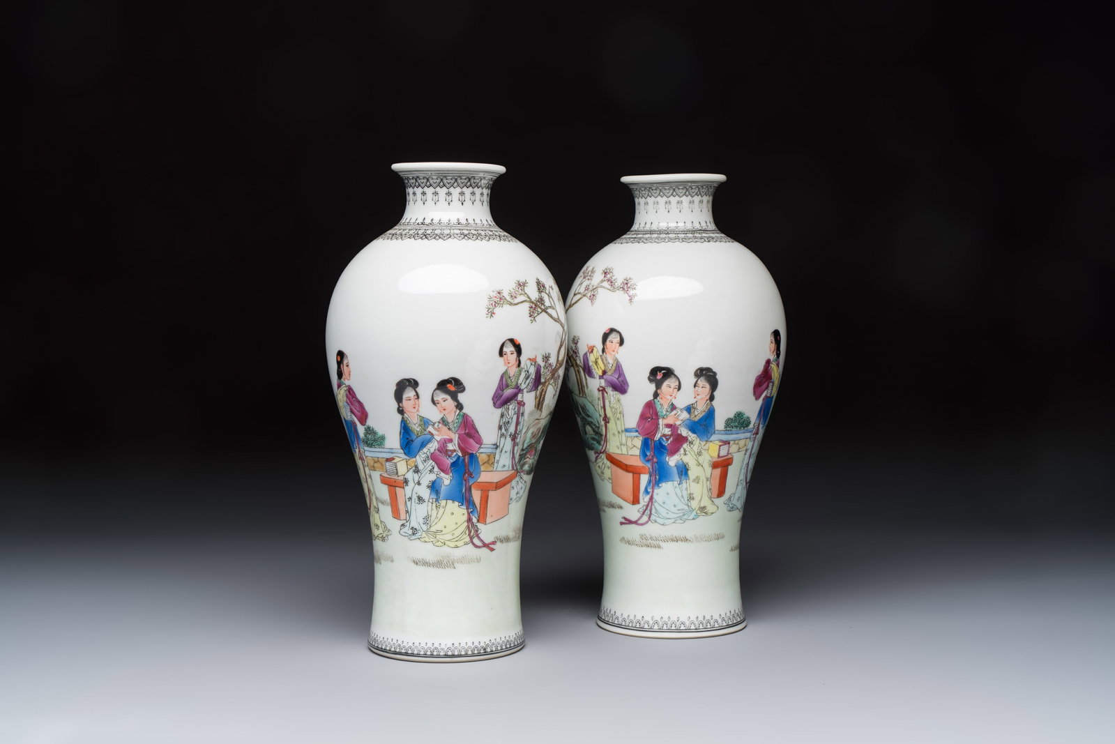 A pair of Chinese famille rose 'Meiping' vases with elegant beauties in a garden, Qianlong mark, (1 of 7)