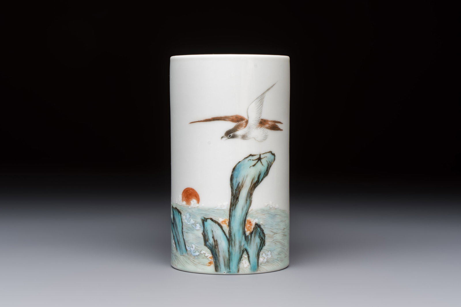 A Chinese polychrome brush pot with a bird standing on rockwork amid waves, Qianlong mark, 20th C. (1 of 7)