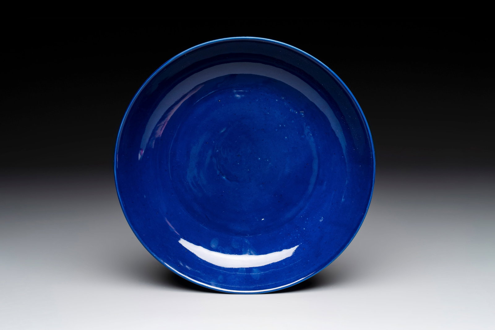 A Chinese sacrificial blue-glazed plate, Guangxu mark and of the period (1 of 2)