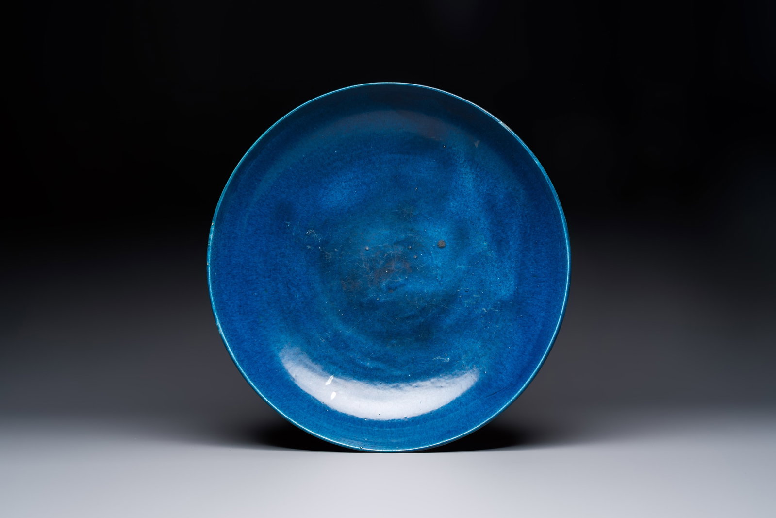 A massive Chinese blue-glazed deep dish, Transitional period/Kangxi (1 of 2)