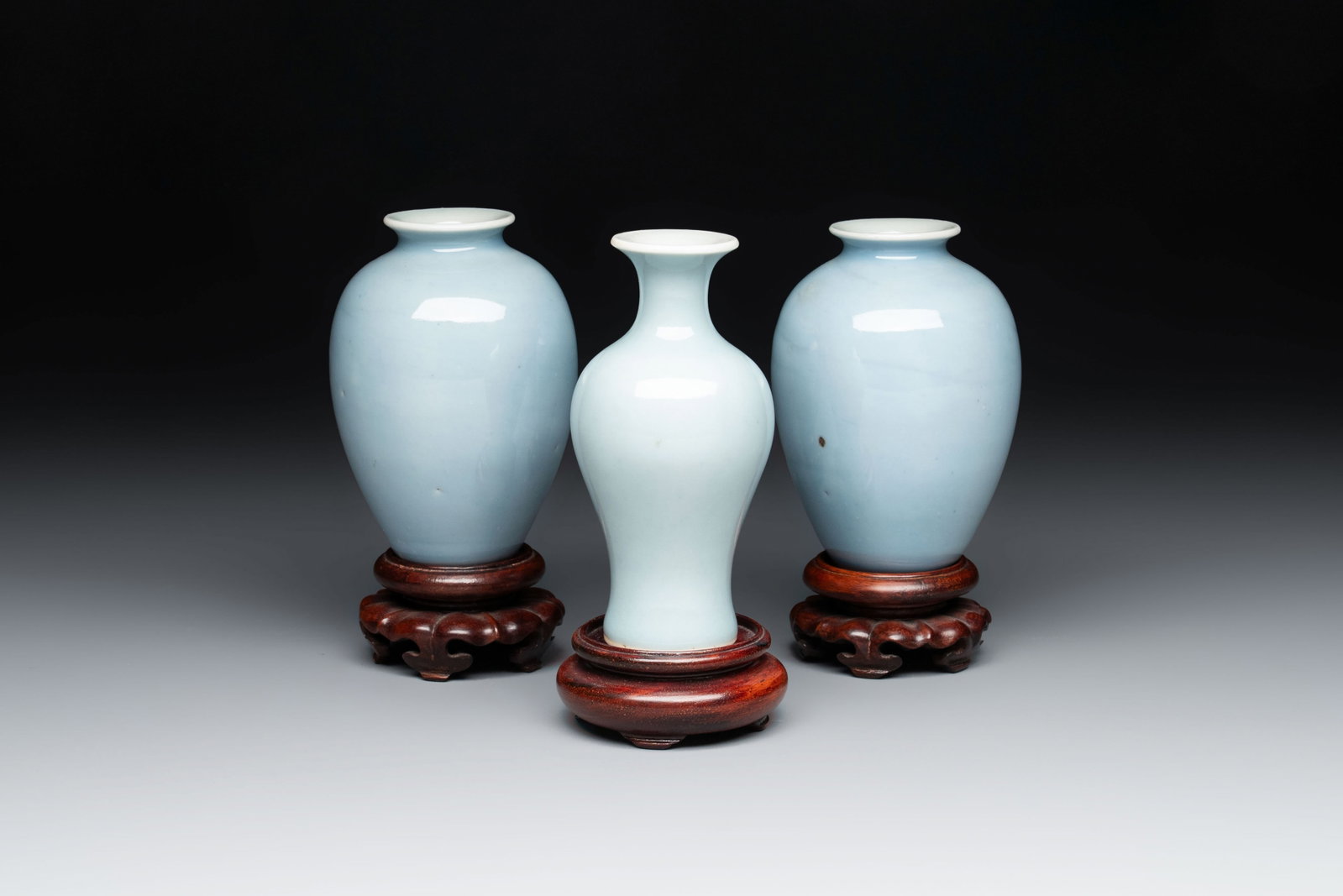 Three Chinese claire-de-lune vases on wooden stands, Kangxi mark, 19th C. (1 of 5)