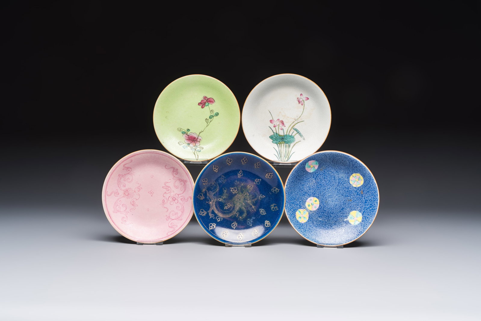 Four Chinese famille rose saucers and a gilt-decorated powder-blue-ground saucer, Qianlong and (1 of 11)